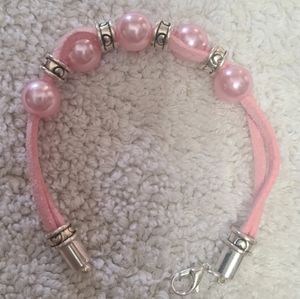 Pink handmade beaded bracelet.